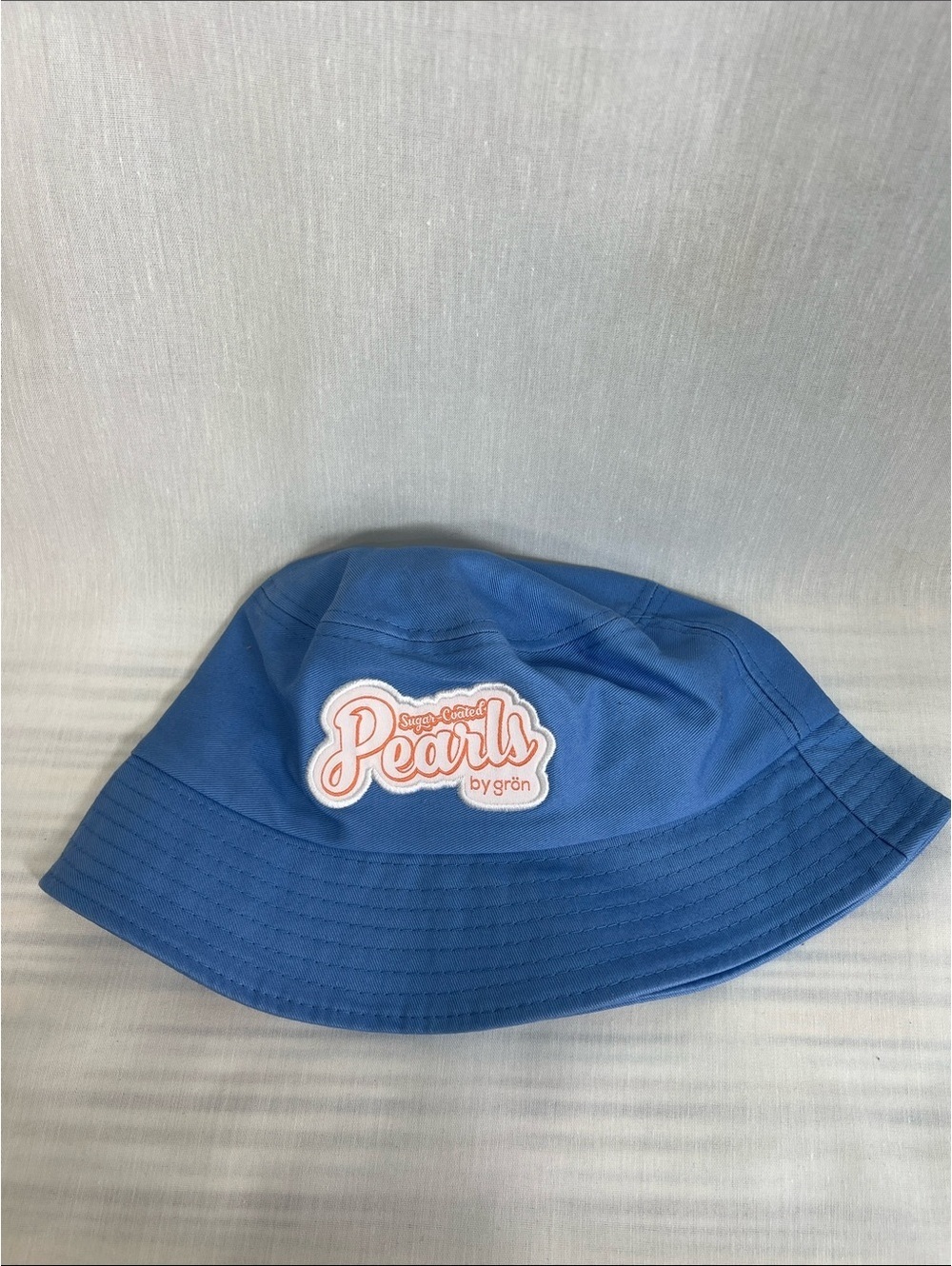 Sugar-Coated Pearls by grön Blue Bucket Hat